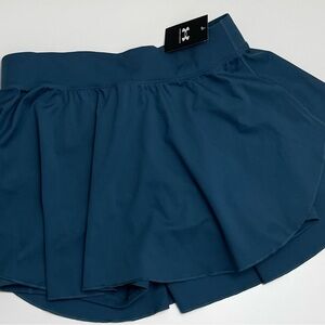 Under Armour Green Mini Skater Skirt with Ruffled High-Low Style for Casual Wear